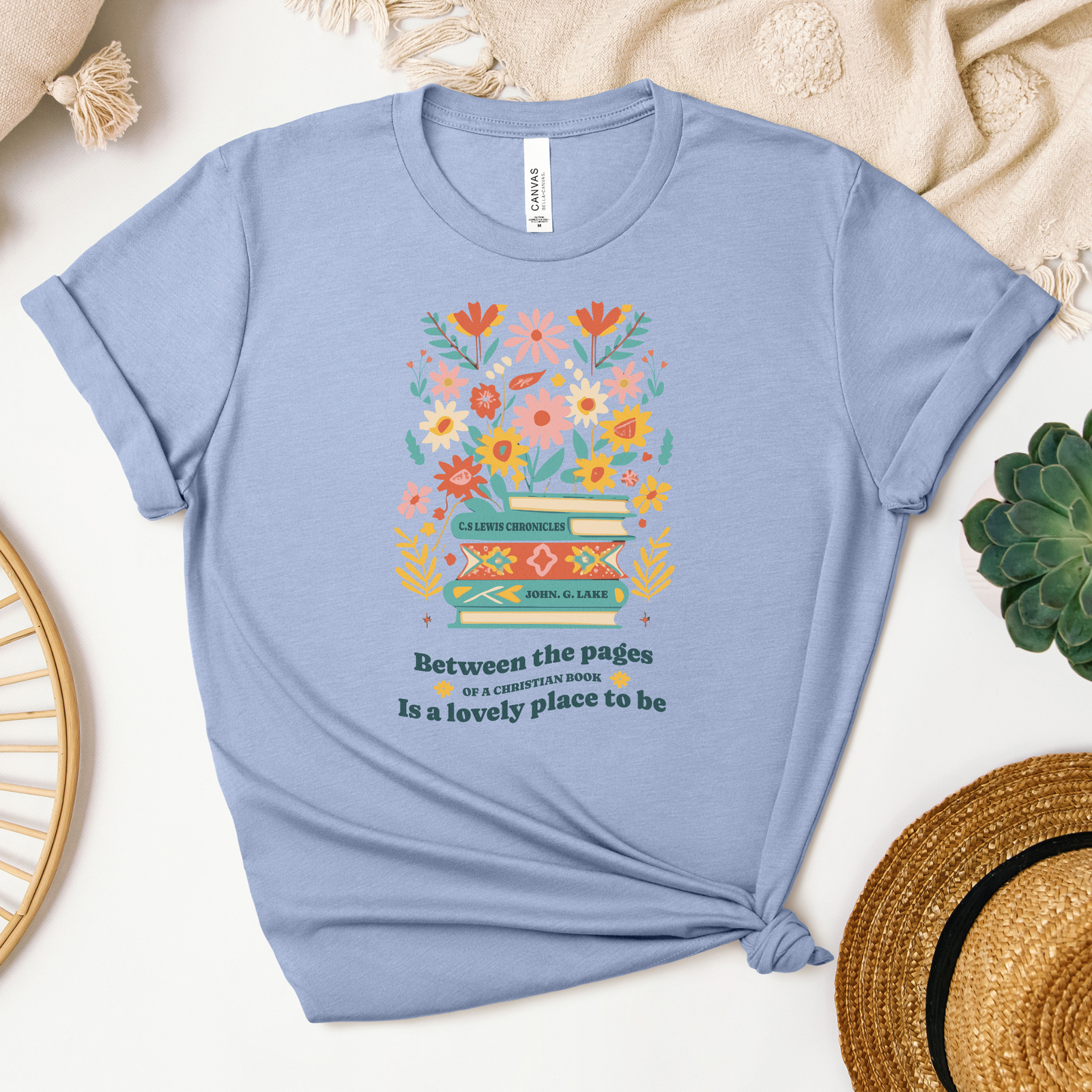 Between The Pages Tee - Heaven Bound Co Christian t-shirts and faith based apparel for teens and adults.